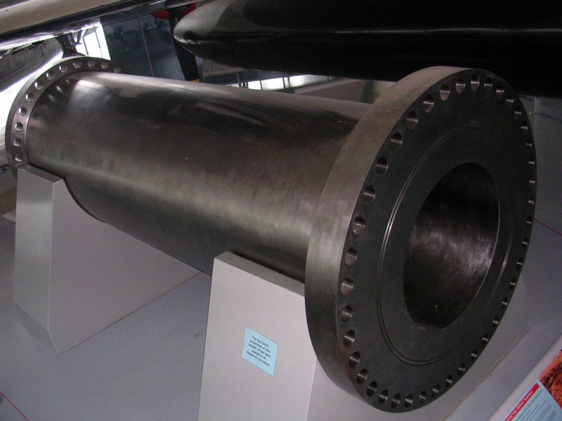 A section of metal tubing in a museum.