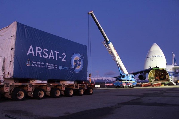 A crane unloads ARSAT-2 from a truck ahead of launch.