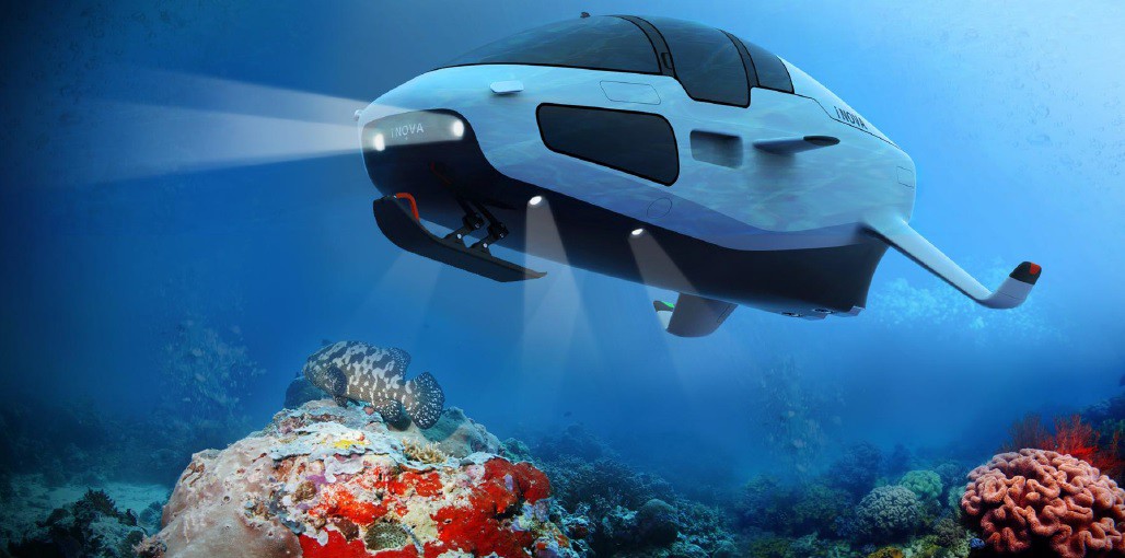 A CGI render of a small submersible craft underwater. It has a ski at the front and wings at the back,