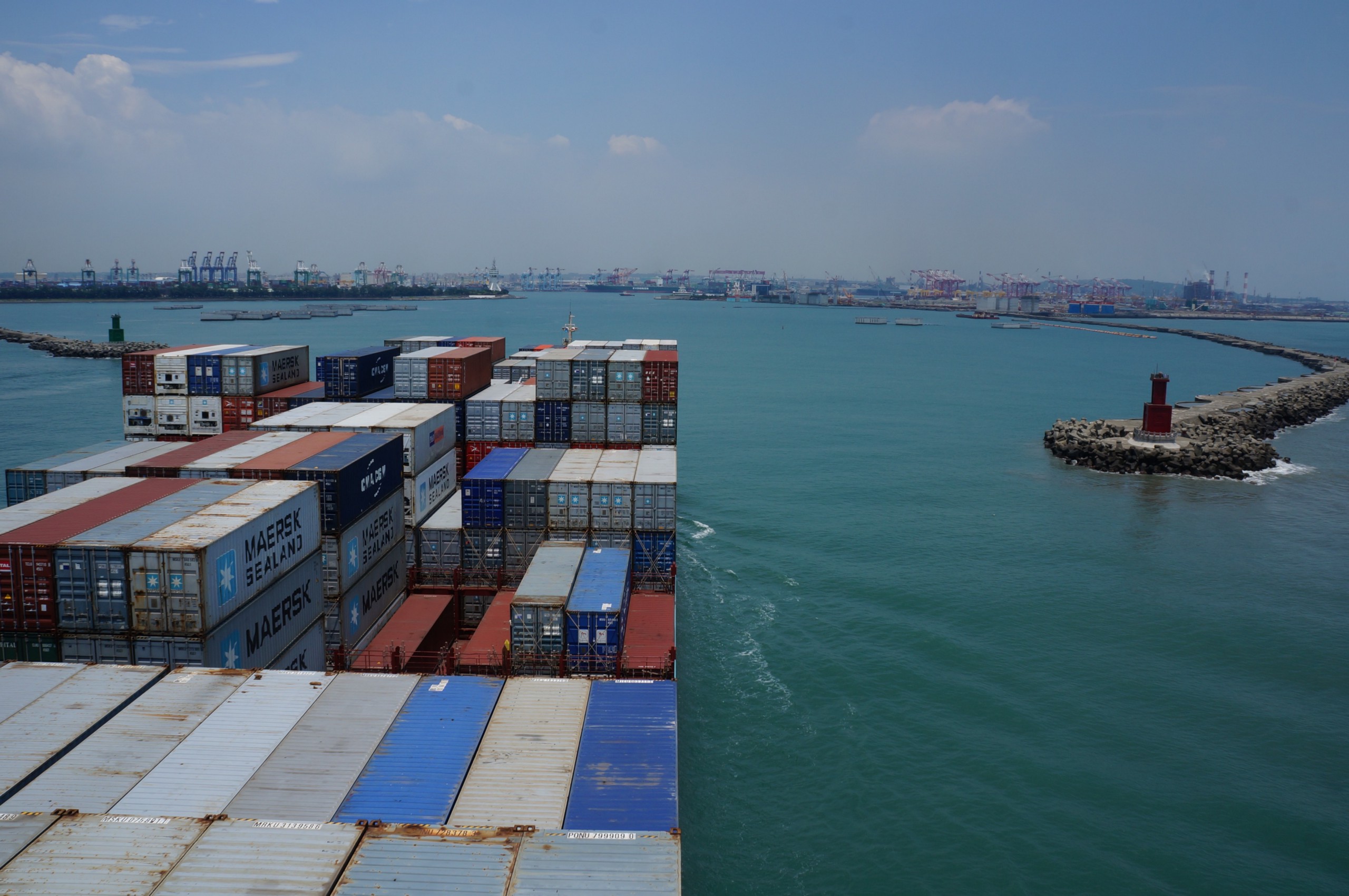 A container ship entering a port.