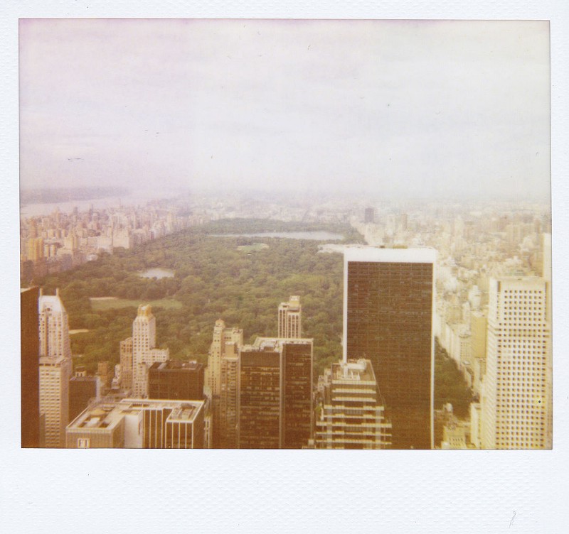 A polaroid picture of Central Park in New York City.