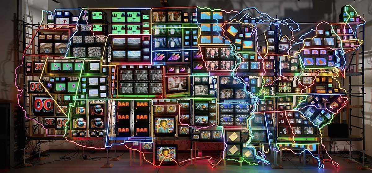An installation of neon tubes and TV sets, in the shape of the contiguous United States of America.