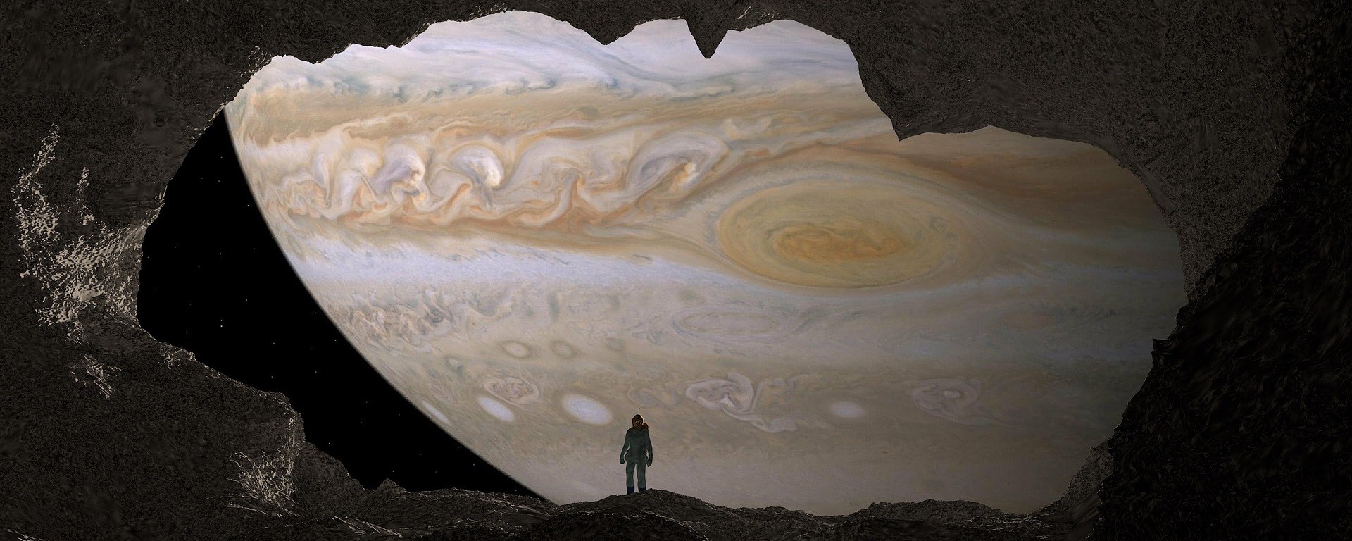 An astronaut stands on the surface of a moon of Jupiter, with the gas giant filling the sky in the horizon.