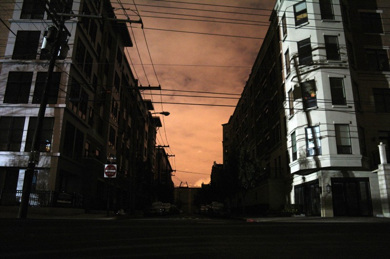 A city street at night, during a blackout.