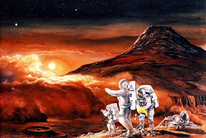 Astronauts in white spacesuits with NASA logos and American flags stand on a Martian cliff, looking out towards the setting sun.