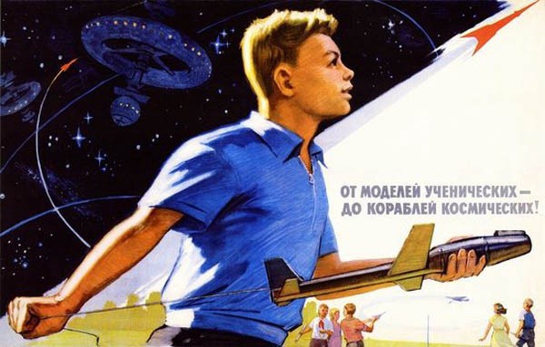 A young boy in a blue shirt holds a model rocket, and gazes up towards space where a circular station orbits.