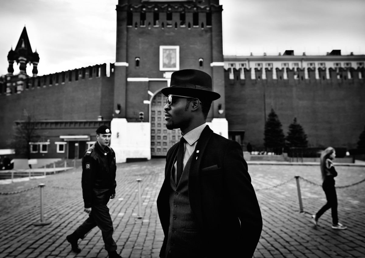 A black man in a suit in Red Square.