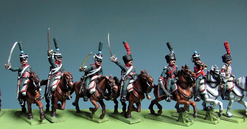 Miniature models of Napoleonic-era French cavalry.