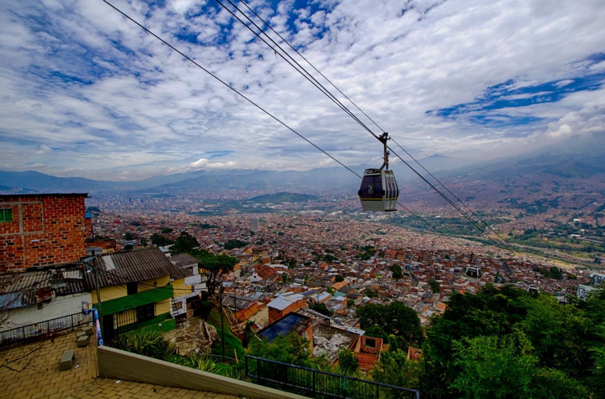 A cable car over a city.
