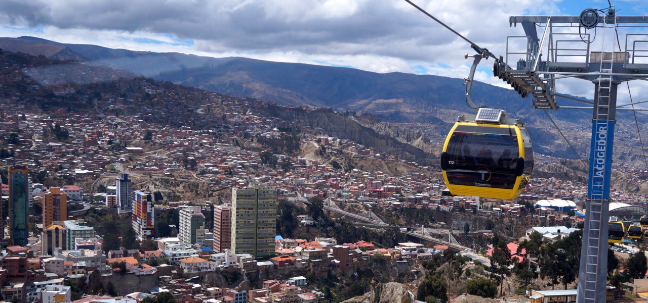 A cable car over a city.