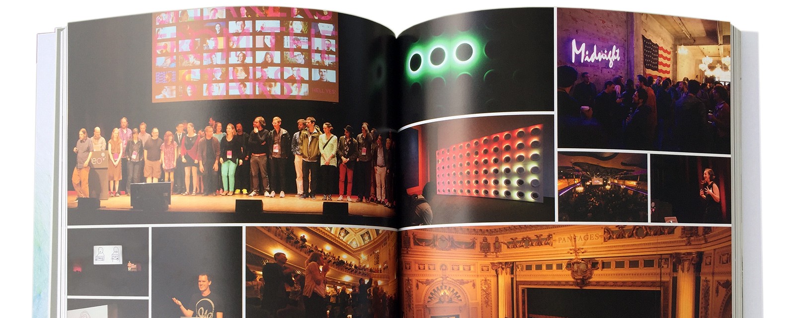 A picture of an open book, showing photographs of the EYEO event.