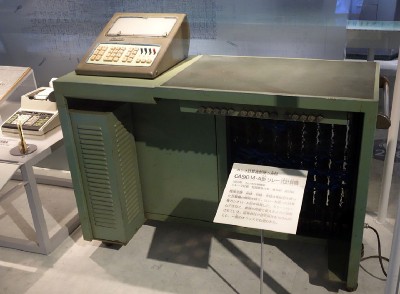 A large desk-sized machine with a control panel.