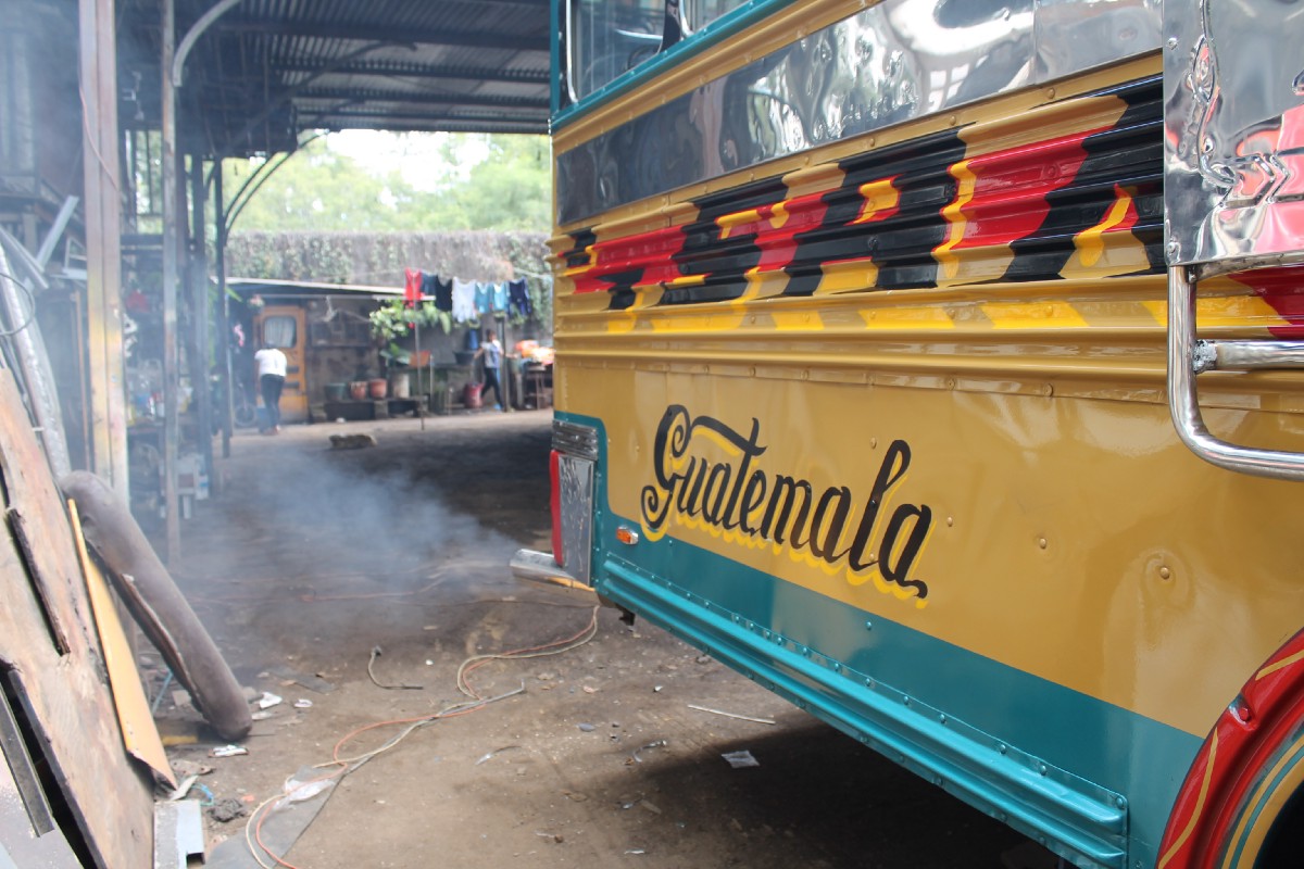 A secondhand U.S. schoolbus now in service in Guatemala, painted in bright colors.