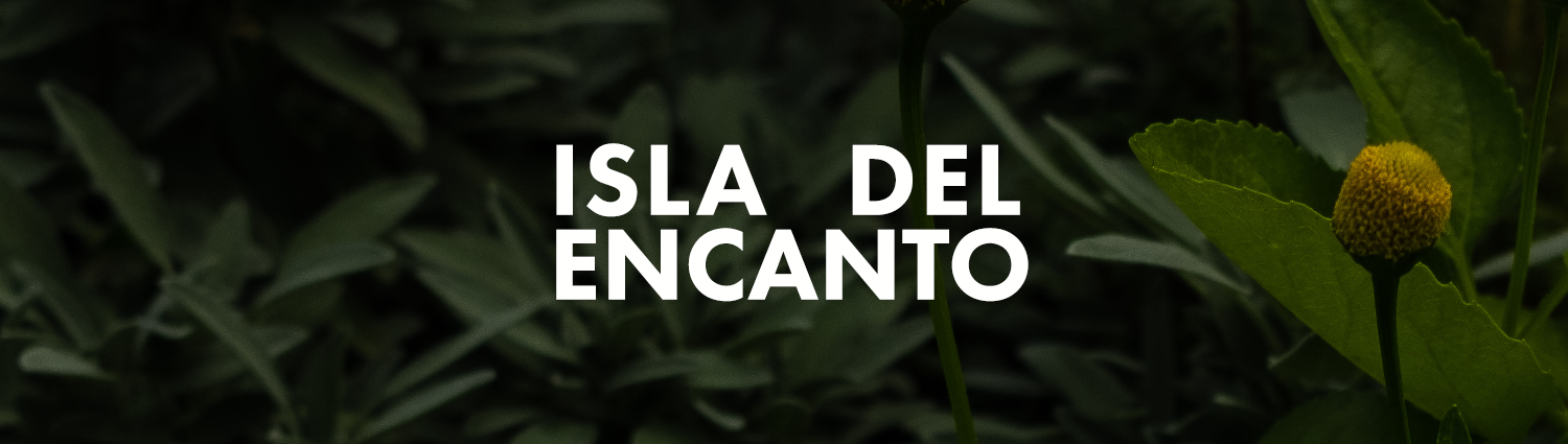 A photo of plants with the words "Isla Del Encanto" superimposed over them.