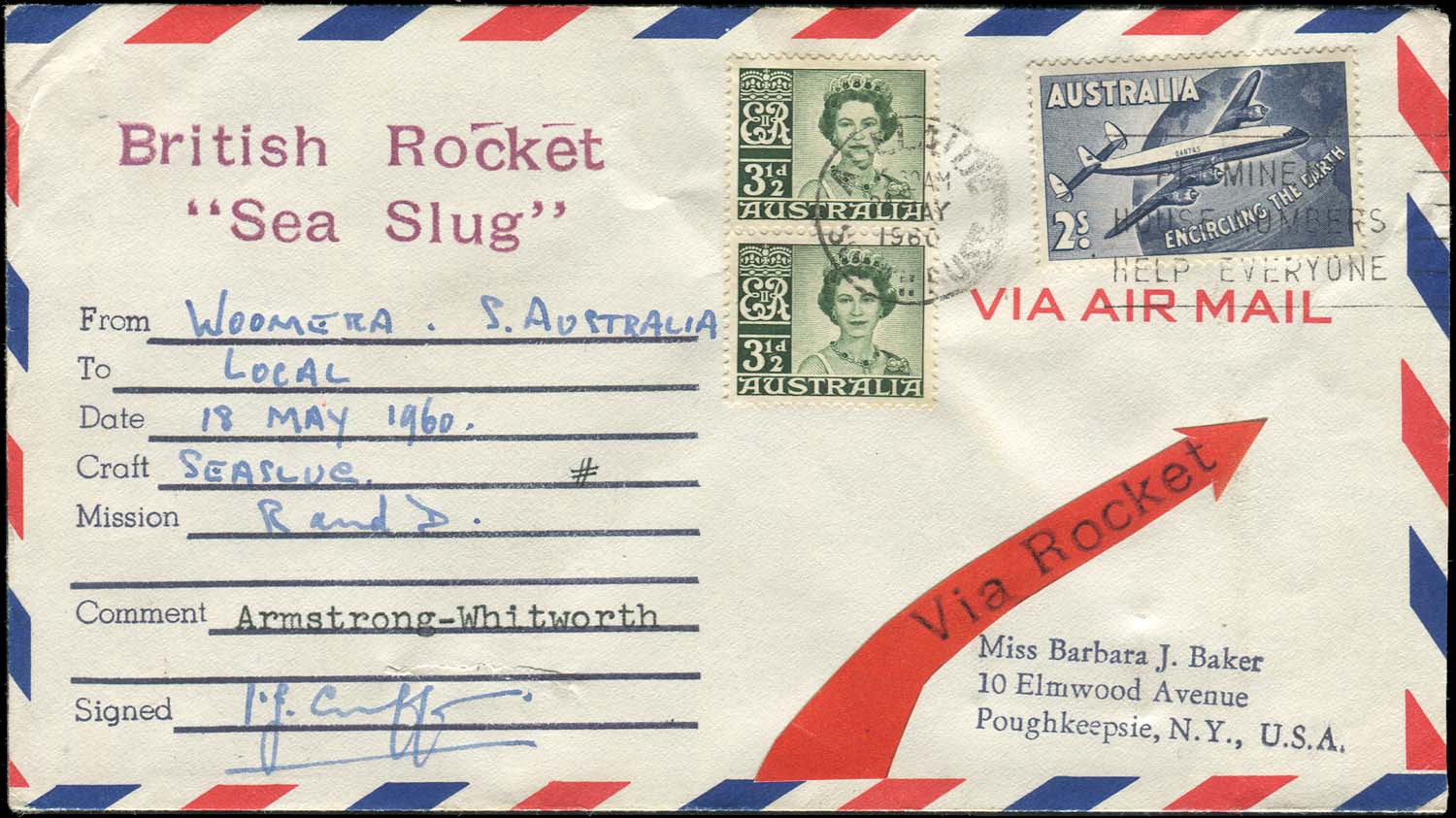 A stamped, addresse envelope. The address of origin is in Woomera, Australia, and the means of deliverance is said to be "British Rocket Sea Slug."